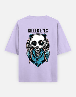 Stylized illustration of a fierce-looking panda in a blue trench coat with intense eyes and hypnotic background pattern on black t-shirt.