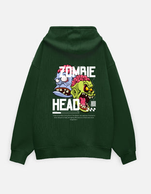 Dark green oversized hoodie featuring a large back graphic with two cartoon zombie heads, bold white “ZOMBIE HEAD” text, and a stylized caption beneath.