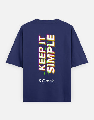Oversized t-shirt featuring bold glitch art typography “Keep It Simple & Classic” in neon distortion with VHS-style effects, perfect for retro-futuristic streetwear.