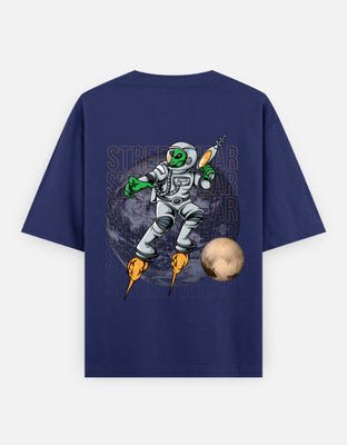 Oversized t-shirt with green alien astronaut graphic and repeating streetwear text, designed by Rizz Studio.