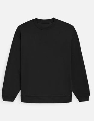 Oversized plain sweatshirt with no graphics, featuring drop shoulders, ribbed hem, and cuffs.