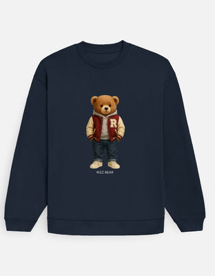 Oversized navy sweatshirt featuring Rizz Bear graphic in a red-and-cream varsity jacket with jeans and sneakers, captioned “RIZZ BEAR” below.