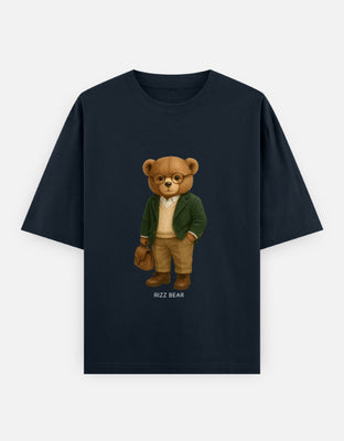 Oversized t-shirt featuring a teddy bear in a green blazer, cream sweater vest, glasses, khakis, and leather briefcase — Ivy League professor look.