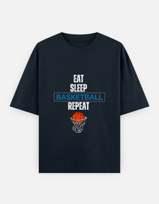 Oversized black t-shirt with “Eat Sleep Basketball Repeat” text and basketball graphic, designed by Rizz Studio.