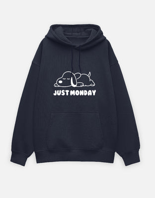 Oversized blue hoodie with a large white sleeping dog illustration and “Just Monday” text on the front center.