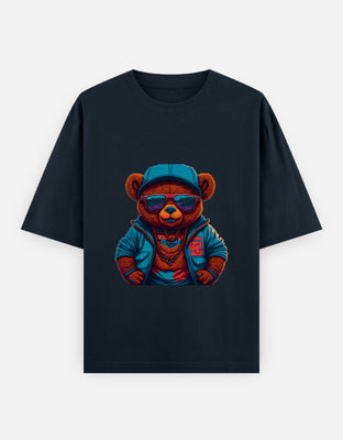 Oversized t-shirt featuring a stylized teddy bear in a bold streetwear look — layered clothing, chains, cap, sunglasses, and detailed graphic textures.