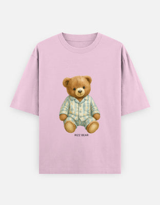 Oversized t-shirt featuring a teddy bear in blue striped pajamas with moon and star patterns – soft and dreamy design.