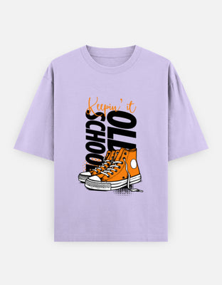 Oversized t-shirt with orange sneakers and the text Keepin’ it, designed by Rizz Studio.
