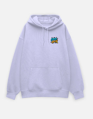Oversized white hoodie with a small left-chest comic-style “GAME OVER” graphic in blue and yellow.