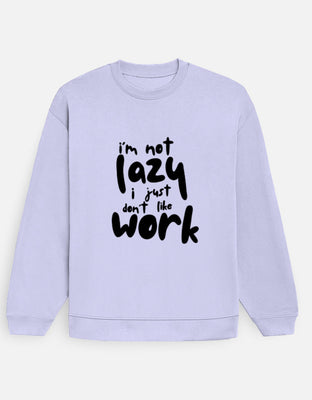 Oversized light purple (lavender) sweatshirt with bold black hand-lettered text reading “i’m not lazy i just don’t like work” printed front-center.
