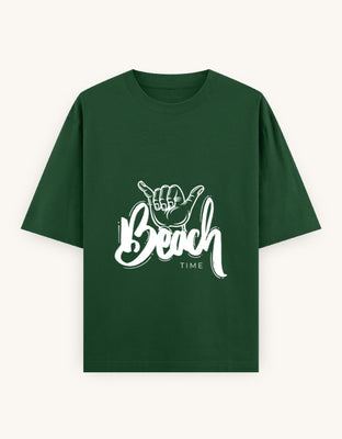 Oversized t-shirt with white Beach Time text and shaka hand graphic, designed by Rizz Studio.