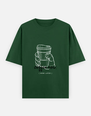 Minimalist line drawing of a hand holding a coffee cup with the phrase “( WINE LATER )” below – a witty dual-mode graphic tee design.
